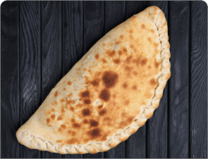 Golden baked calzone with a crimped edge